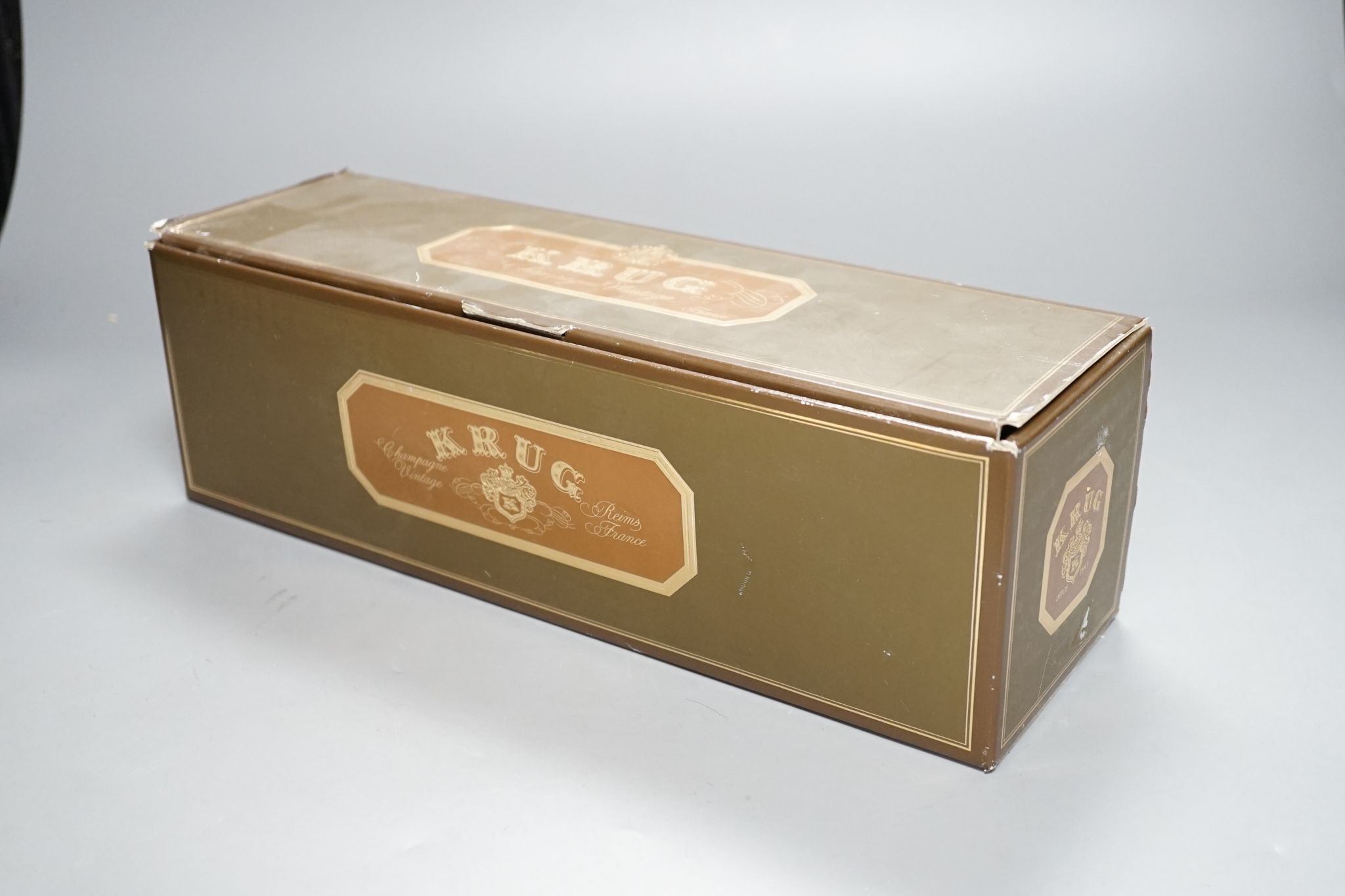 A single cased bottle of Krug 1976 Champagne